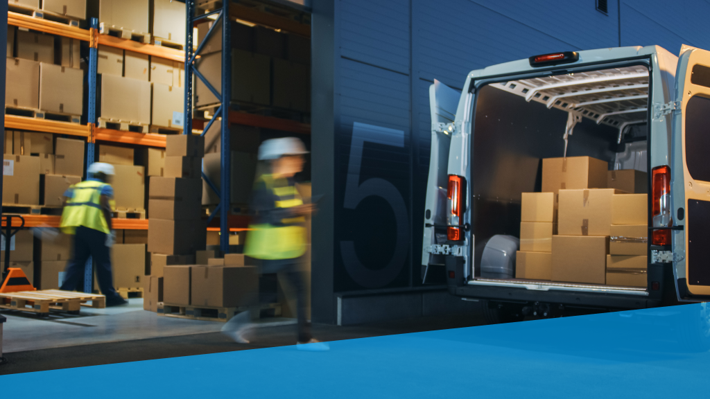 An image showing warehouse workers loading a vehicle outside a warehouse.